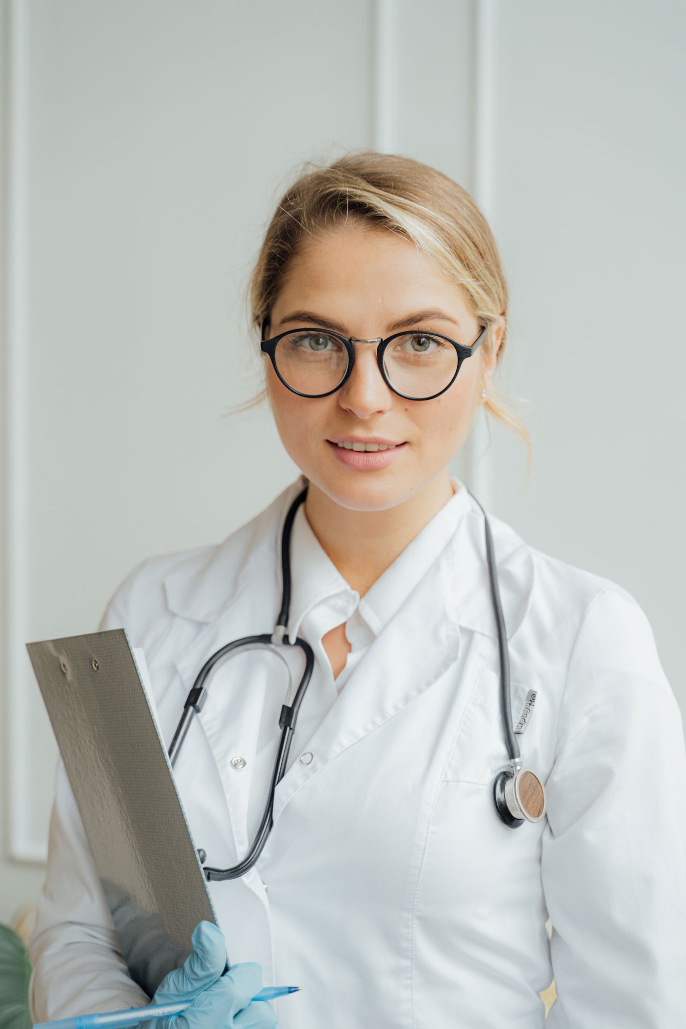 Licensed physician reviewing a patient chart